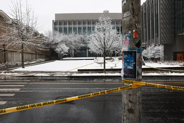 Few cameras, open doors at Brown building where shooting occurred Few cameras, open doors at Brown building where shooting occurred