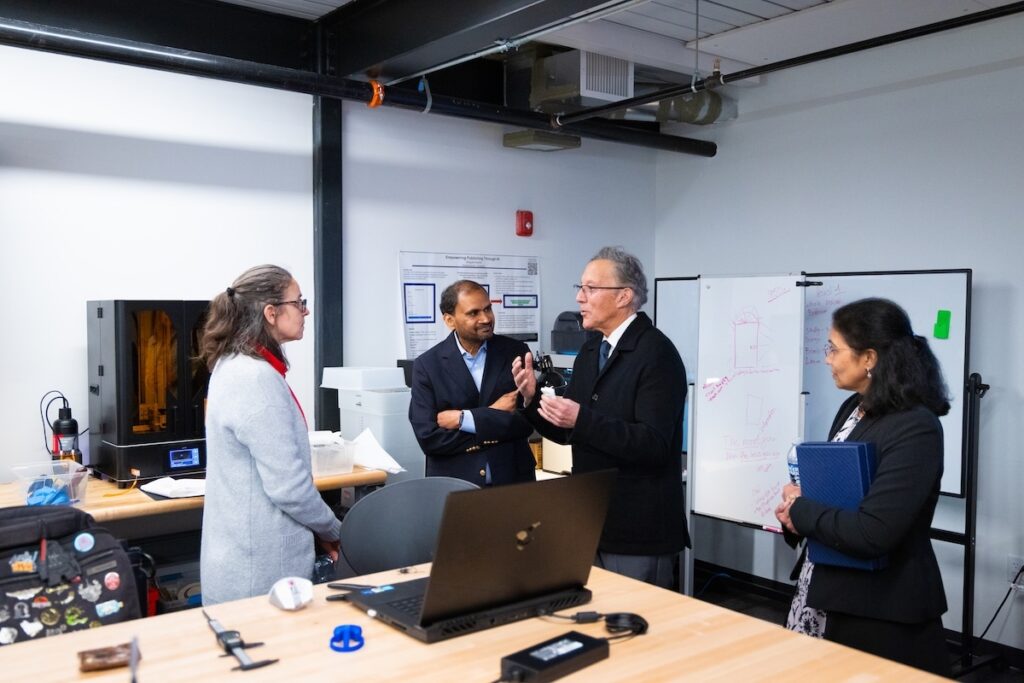 Shenandoah University’s Advanced Technology Programs Benefit From Ferrari Family’s Support Andy Ferrari and Raj and Neeraja Lingam talk to Shenandoah University staff in the Makerspace.
