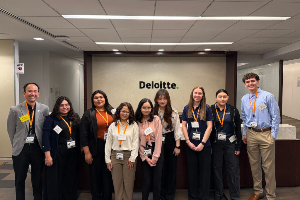 Shenandoah University Business Students Visit Deloitte For Career Exploration And Networking Accounting students and faculty pose for a photograph in one of Deloitte's offices.