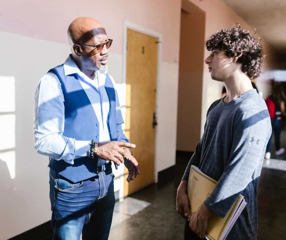 How to Talk to Professors: A Complete Guide to Building Academic Relationships professor talking to his student
